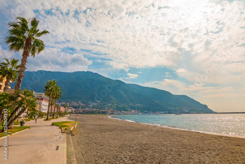 Obraz na płótnie The photo of Naples, a vibrant Italian city, with its historic architecture, bustling streets, and the iconic Mount Vesuvius in the background, set against a blue sky w salonie