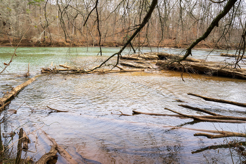 Beautiful view along Hewlett Lodge Trail, Chattahoochee River in winter season. The water is calm with emerald green color, great for riverview or doing exercise, jogging around.  photo