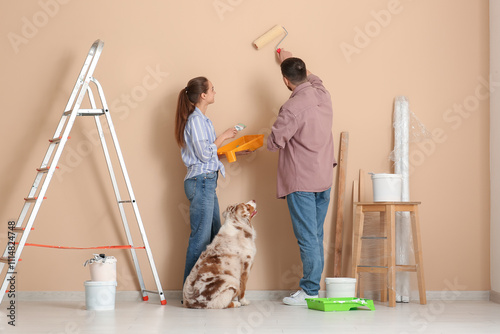 Young couple with cute dog ...