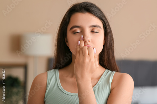 Beautiful young woman doing...