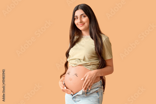 Happy pregnant woman with d...
