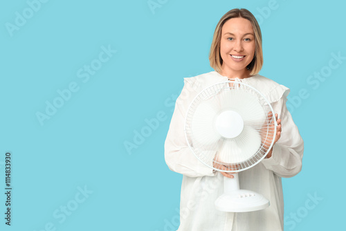 Smiling woman holding white...