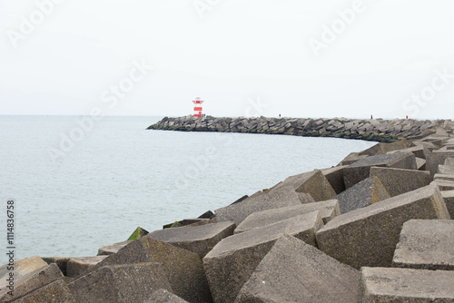 Lighthouse and the waves. Netherlands