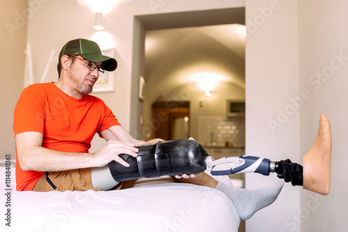 Man Adjusting Prosthetic Leg in Modern Living Room Setting photo