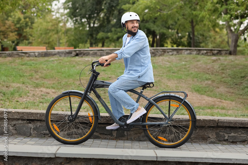 Young happy man in helmet r...