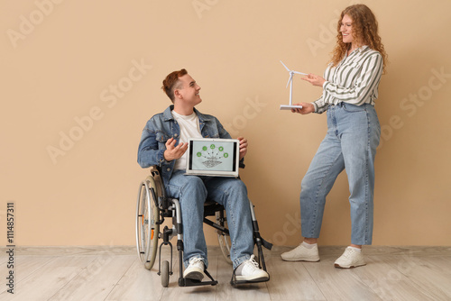 Young people with laptop an...