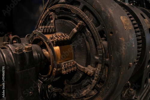 Close up of a vintage motor generator set, metal casting, copper coils, nobody