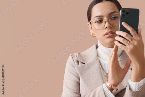 Fashionable young woman in ...