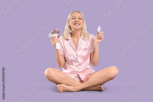 Happy mature woman in pajam...