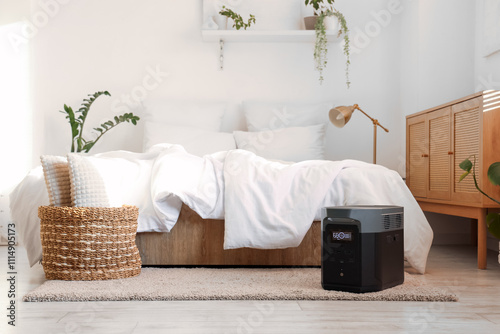 Interior of light bedroom w...