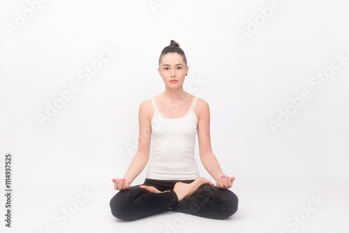 Young woman doing yoga exercise photo