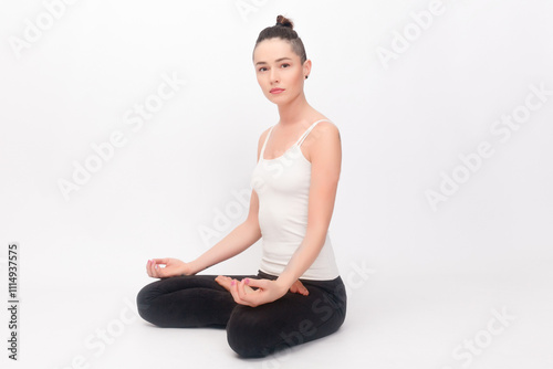 Young woman doing yoga exercise photo