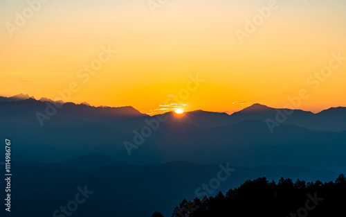 Landscape view of gloomy Sunrise over the mountian in  Sailung, Nepal. photo