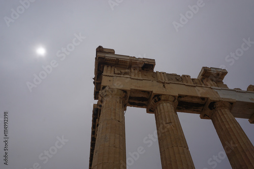 Athens, Greece: Detail of the Parthenon, 447-438 BCE, at the Acropolis of Athens, under a hazy sky caused by dust pollution. photo