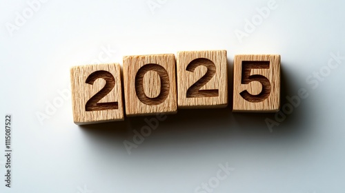 Wooden Blocks Spelling 2025: New Year's Resolution, Future Plans, and Time Concept photo
