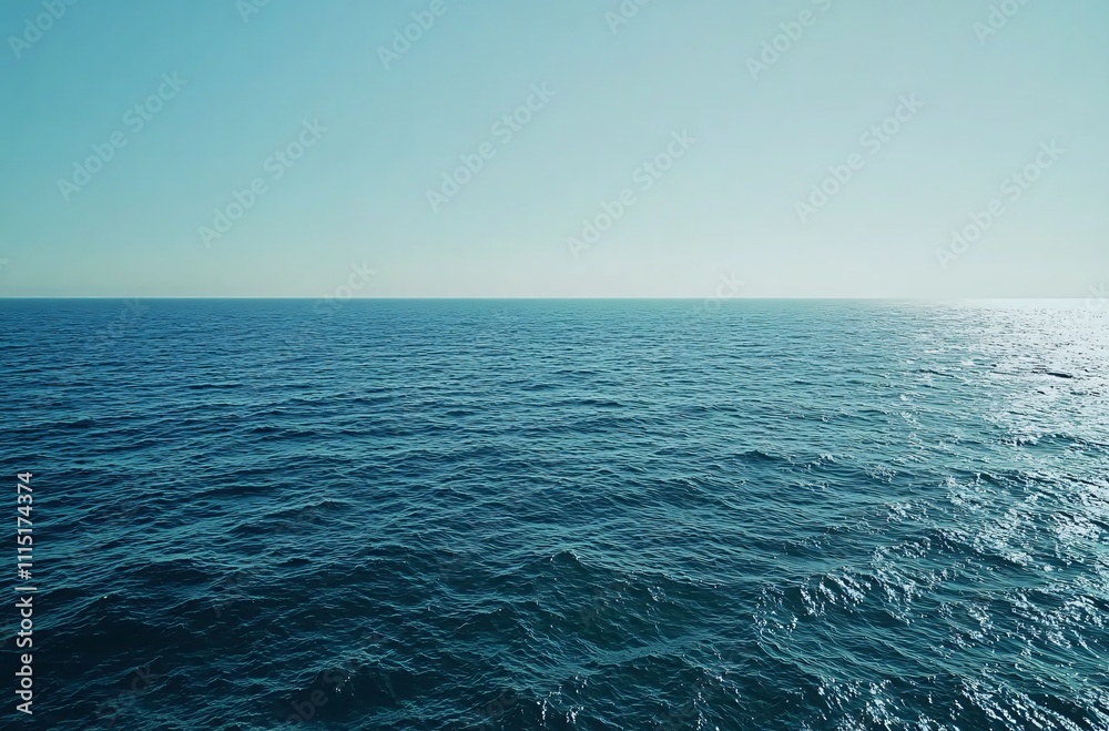 Fototapeta premium A vast and tranquil ocean stretching to the horizon, capturing the endless beauty of the Pacific or Atlantic, creating a perfect wallpaper with negative space for travel and commercial backgrounds.