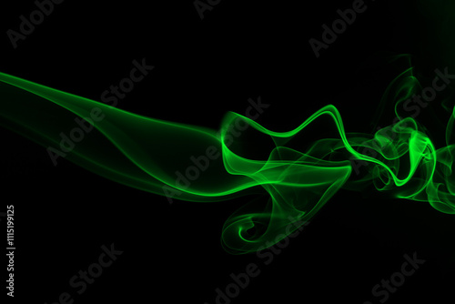 Green smoke on black background, darkness concept