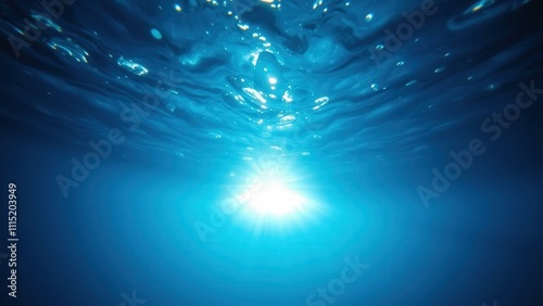 Serene Underwater Sunlight: Captivating Blue Ocean Depths, Perfect for Wall Art or Desktop Backgrounds