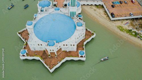 Aerial drone view of a floating mosque  by the seaside at Tanjung Bungah, Penang, Malaysia  photo