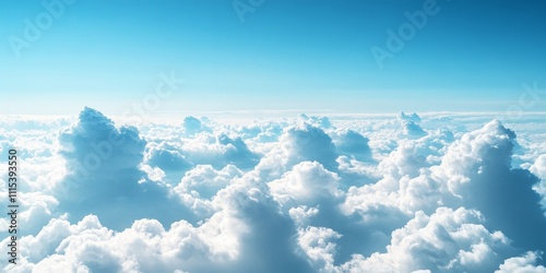 Aerial view of a sky scape featuring blue and white fluffy clouds, captured from an airplane window. This cloudscape showcases the beauty of clouds from a unique aircraft perspective. photo