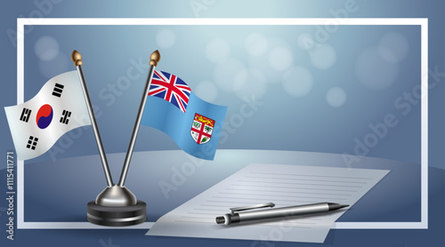 South Korea and Fiji Small national flag on bokeh background, cooperative relationship
