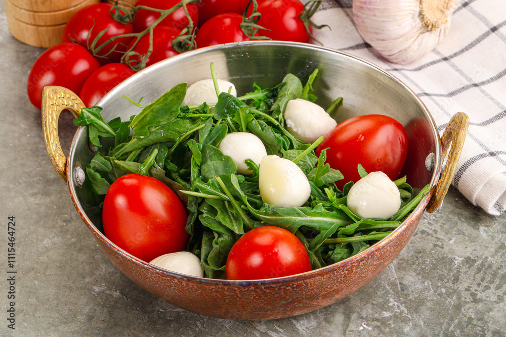 Salad with mozzarella and arugula Salad with mozzarella and arugula