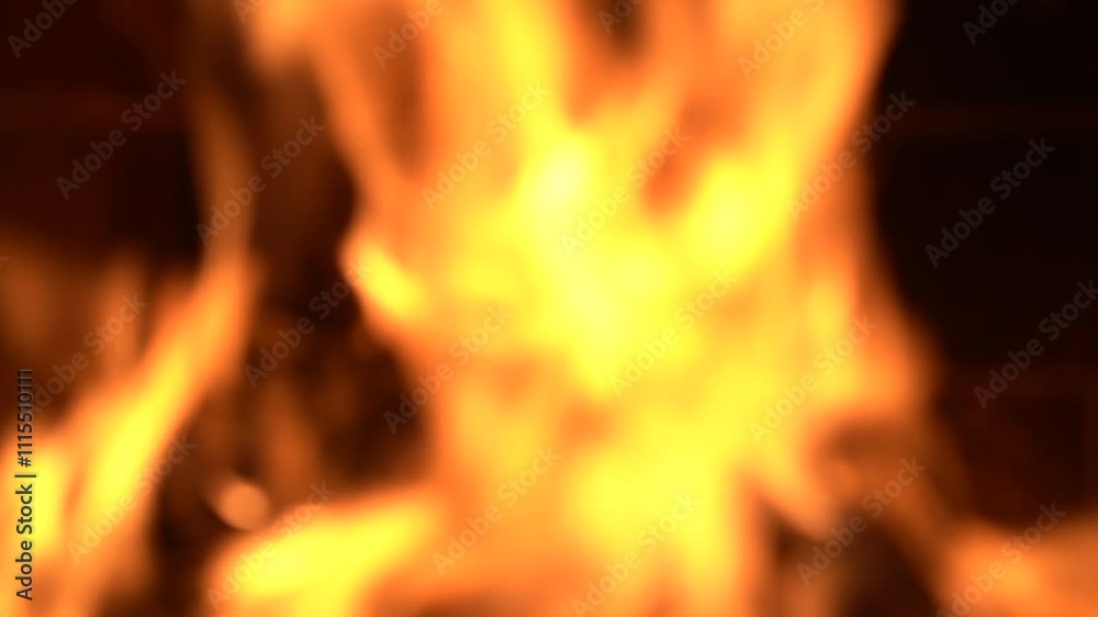 A fire burns in a fireplace, winter vacation in country house,close up, defocused A fire burns in a fireplace, winter vacation in country house,close up, defocused