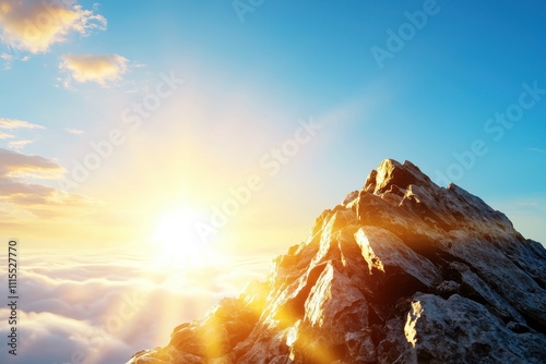 Majestic Sunrise Over Rocky Mountain Peak Above Cloud Coverage photo