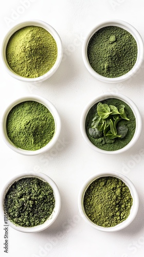 Assortment of Exquisite Green Powders and Superfoods photo