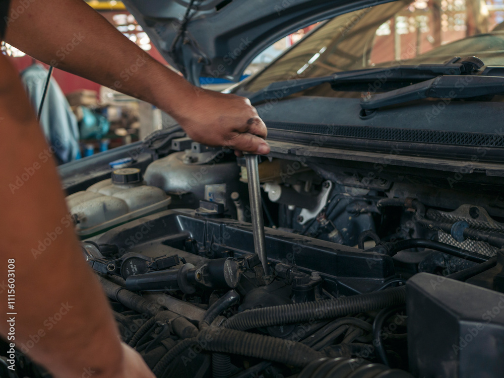 Close up Man hands fixing Car machinery vehicle mechanical service. Mechanic man hands repairing car auto repair shop. open vehicle hood checking up auto mobile. Vehicle Car maintenance engineer. Close up Man hands fixing Car machinery vehicle mechanical service. Mechanic man hands repairing car auto repair shop. open vehicle hood checking up auto mobile. Vehicle Car maintenance engineer.