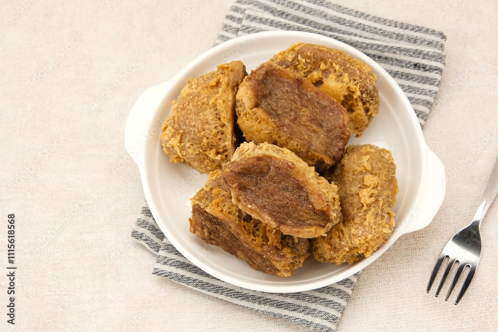 Tahu Walik, fried tofu stuffed with meatball. Indonesian food
Tahu Walik, fried tofu stuffed with meatball. Indonesian food
