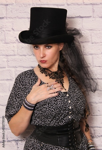 Woman Wearing Vintage Style Fashion. Victorian Steampunk Style photo