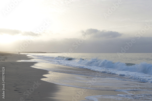 Beautiful sunrise on gloomy morning in Cabo Verde on the beach of Atlantic Ocean.