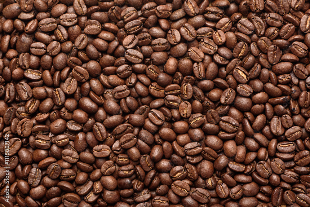 Fototapeta premium Background of brown roasted coffee beans