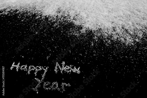 Natural white snow with Christmas inscription on the black background