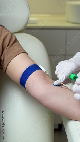 Wallpaper Mural Doctor draws the patient's blood for examination. Close Up of doctor's hand holds a syringe and a vaccine bottle at the hospital. Disease Prevention Immunization. Health and medical concepts. Torontodigital.ca