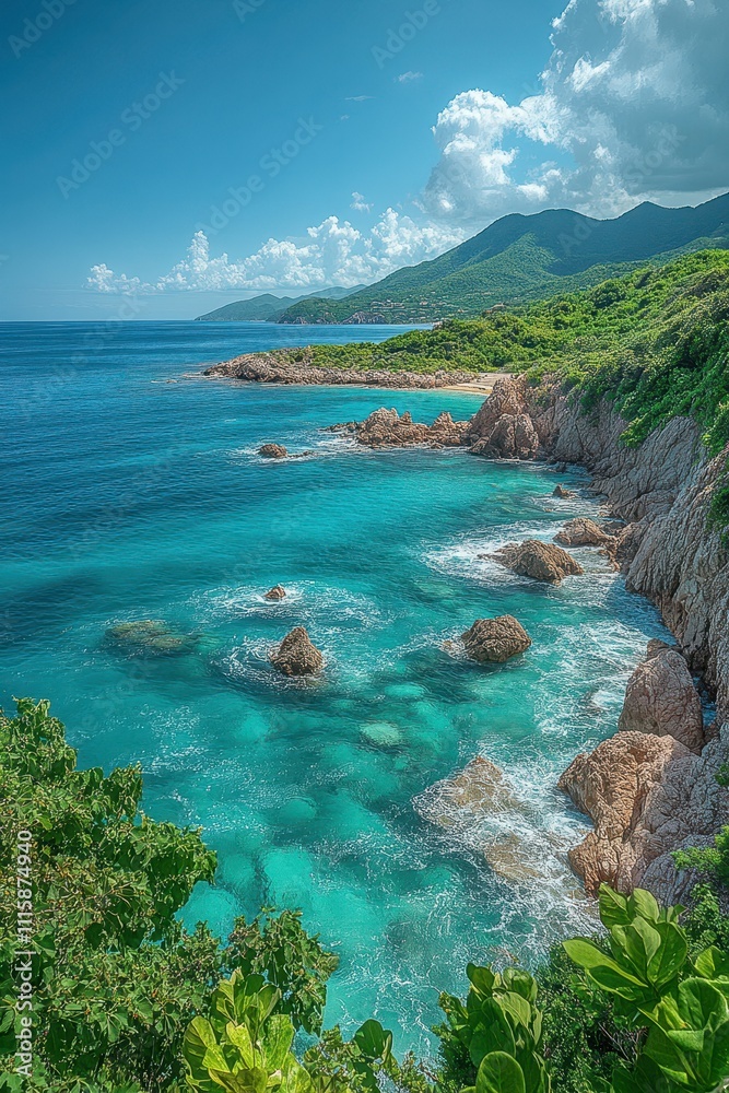 Obraz premium Stunning Coastal Landscape with Turquoise Waters and Rocky Shoreline Under a Clear Blue Sky