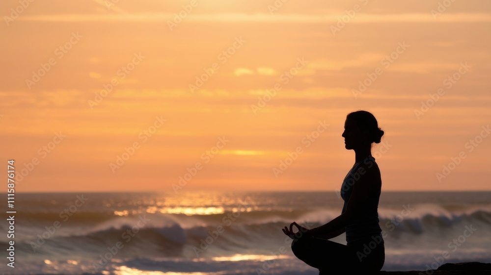 Fototapeta premium A person meditating at sunset by the ocean, promoting tranquility and mindfulness.