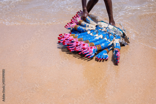 Kulasai Dasara, Handmade colorful hand on ocean beach during the kulasai dasara festival in India. photo