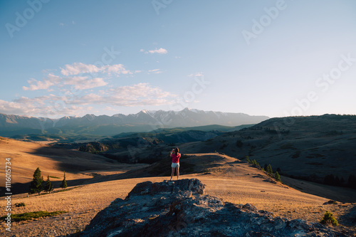 Woman Admiring Mountain Lan...