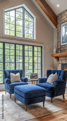 Elegant blue chairs with cozy decor in a modern living room with large windows