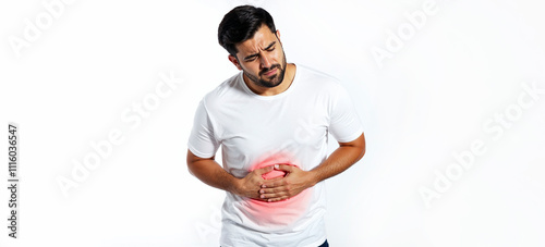 Man holding her stomach showing pain on a white background. Pain in the abdomen, stomach