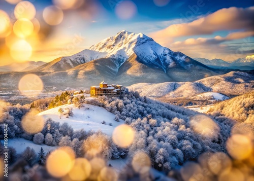 Aerial View of Snow-Capped Mountains in Winter: Scenic Landscape of Mount Terminio, Serino, Avellino, Irpinia, Campania, Italy with Enchanting Bokeh Effect photo