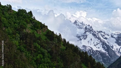 Clouds moving over mountain peaks timelapse
