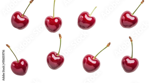A collection of glossy, heart-shaped cherries arranged in a playful pattern, showcasing their vibrant color and unique shape.