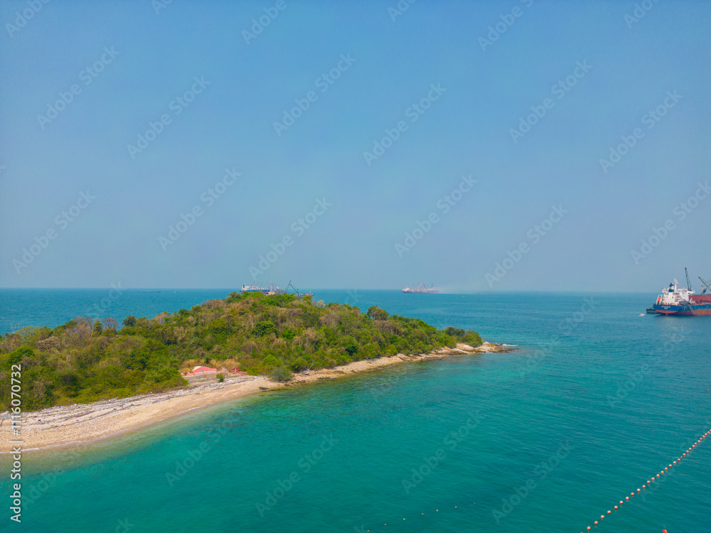 Naklejka premium Aerial view exotic tropical island sea beach green forest blue sky with cloud