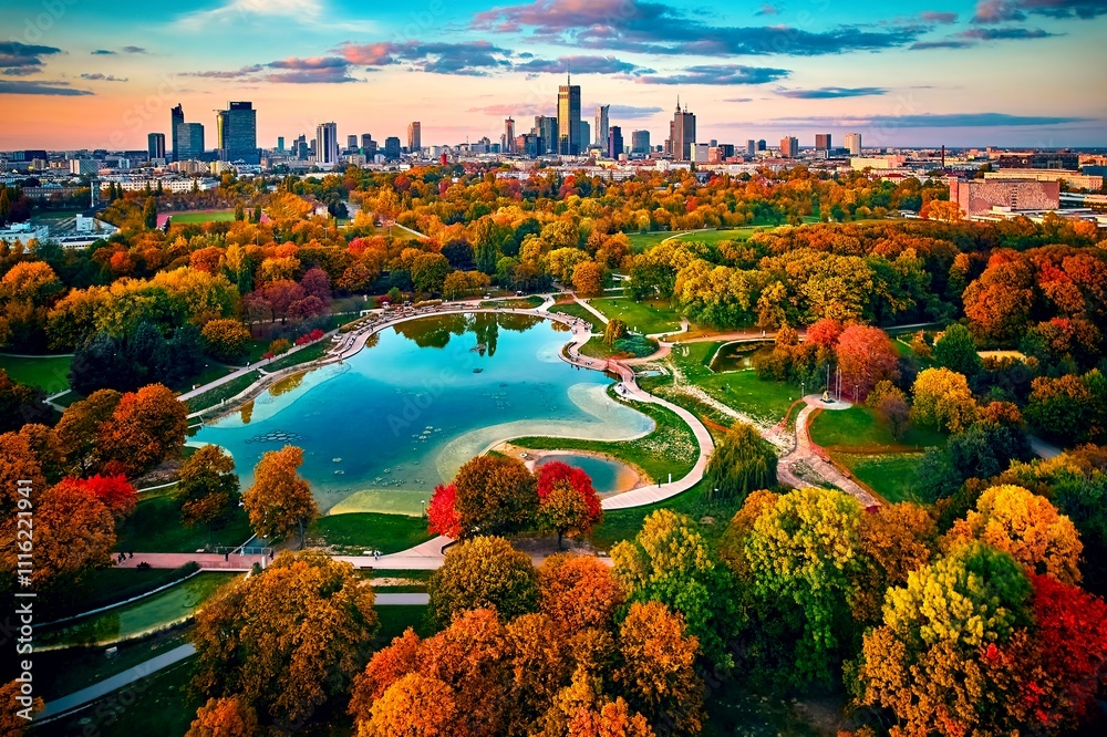 Beautiful panoramic drone sunset view on skyline, the skyscrapers of Warsaw City and Pole Mokotowskie (Mokotow Field) in the colors of the golden Polish autumn - is called the