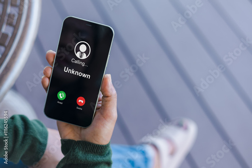 Bilde på lerret Woman receives a phone call from an unknown number, Concept of scammers or strangers, fraud, and contact to sell mobile internet promotions, spam, fake identity, scammer, scam with mobile phone