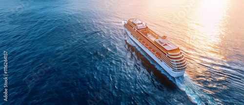 A cruise ship glides across the calm ocean as the sun sets, painting the water with hues of gold and tranquility. photo