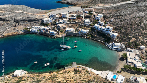 Aerial drone photo of scenic natural secluded fjord and small fishing village of Cheronisos in Northern part of Sifnos island, Cyclades, Greece photo